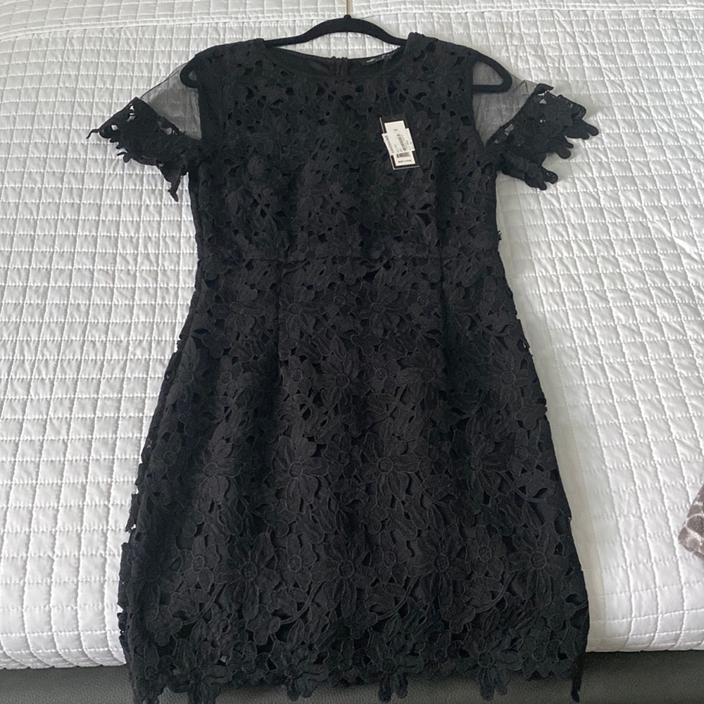 Romeo and Juliet couture lace dress , new with tags .